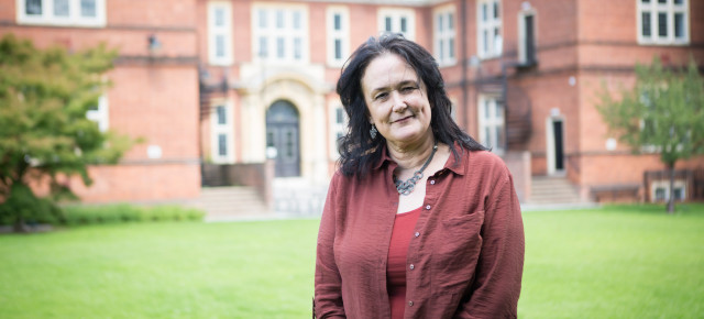 Carol Fuller outside the University