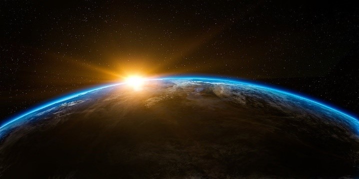The sun rises over the Earth
