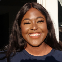 Headshot of Faith Chishato smiling