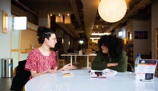 Two people in conversation