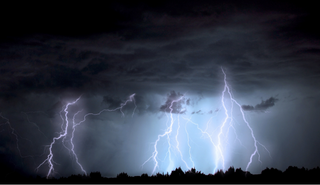 Lightning emerging from clouds