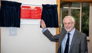 Professor Sir Brian Hoskins unveils the plaque bearing his name as the Meteorology building is renamed Brian Hoskins at a ceremony on 13 September 2022