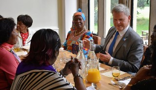 The University of Reading Vice-Chancellor sitting down to lunch and chatting with members of the Reading Golders Luncheon Club