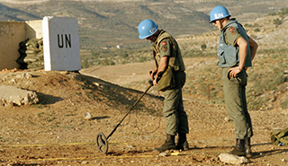 Norwegian soldiers search for mines in Lebanon, as part of the United Nations Interim Force in Lebanon (1990)