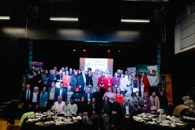 A large group of people posing for a photo