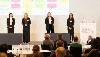 Team Zoned presenting on stage at Your Entrepreneurs Scheme 2026 at the Royal Society