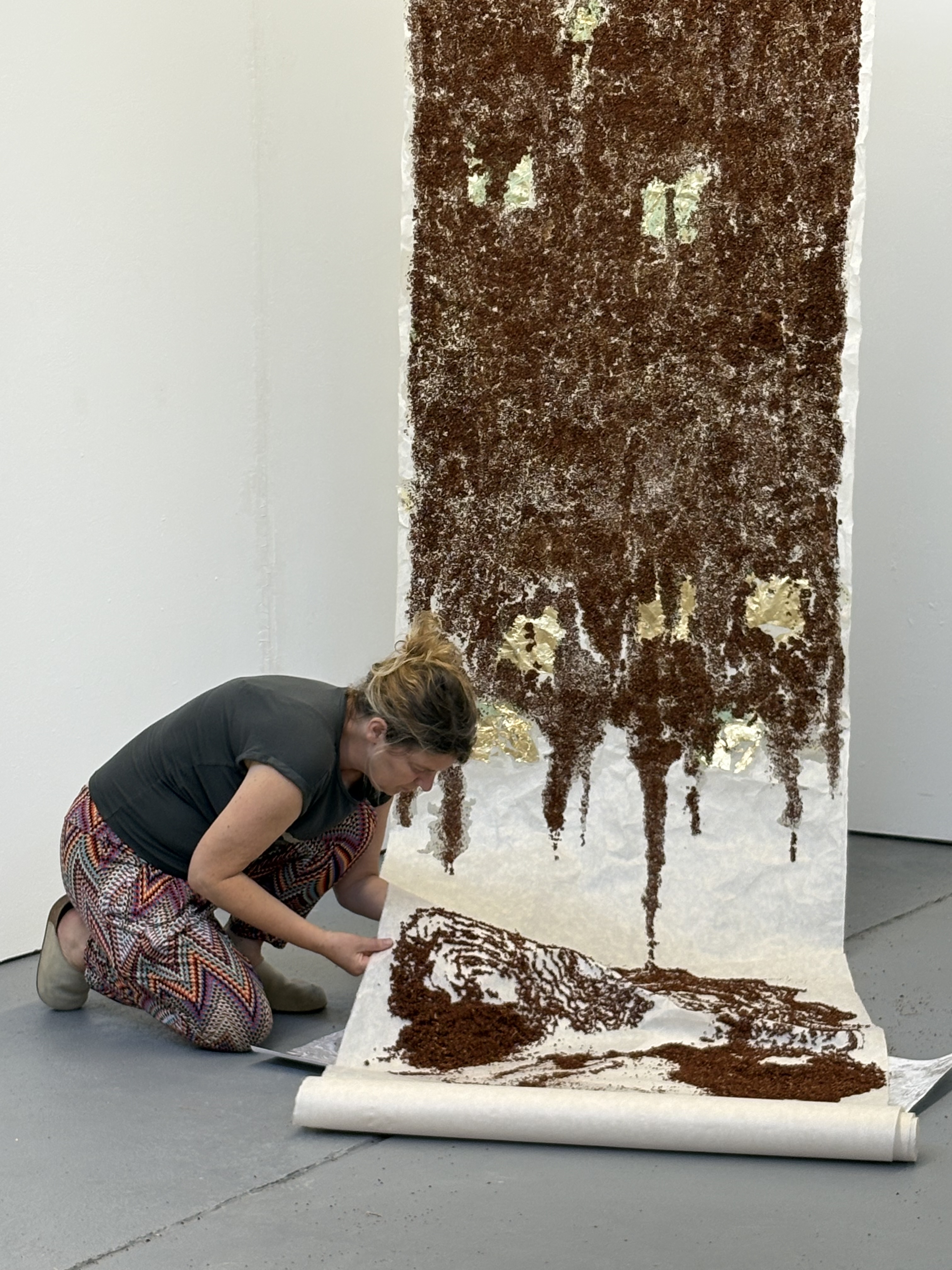 An artist preparing for the exhibition