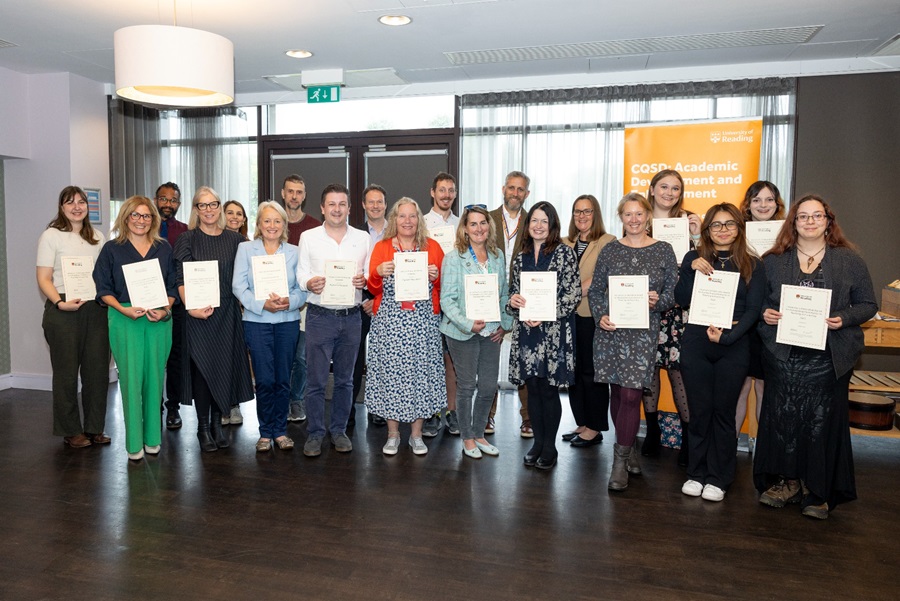 Teaching and Learning award winner with their certificates at the Celebrating T&L Success 2023 event