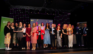 Stage full of 2024 Celebration of Volunteering winners