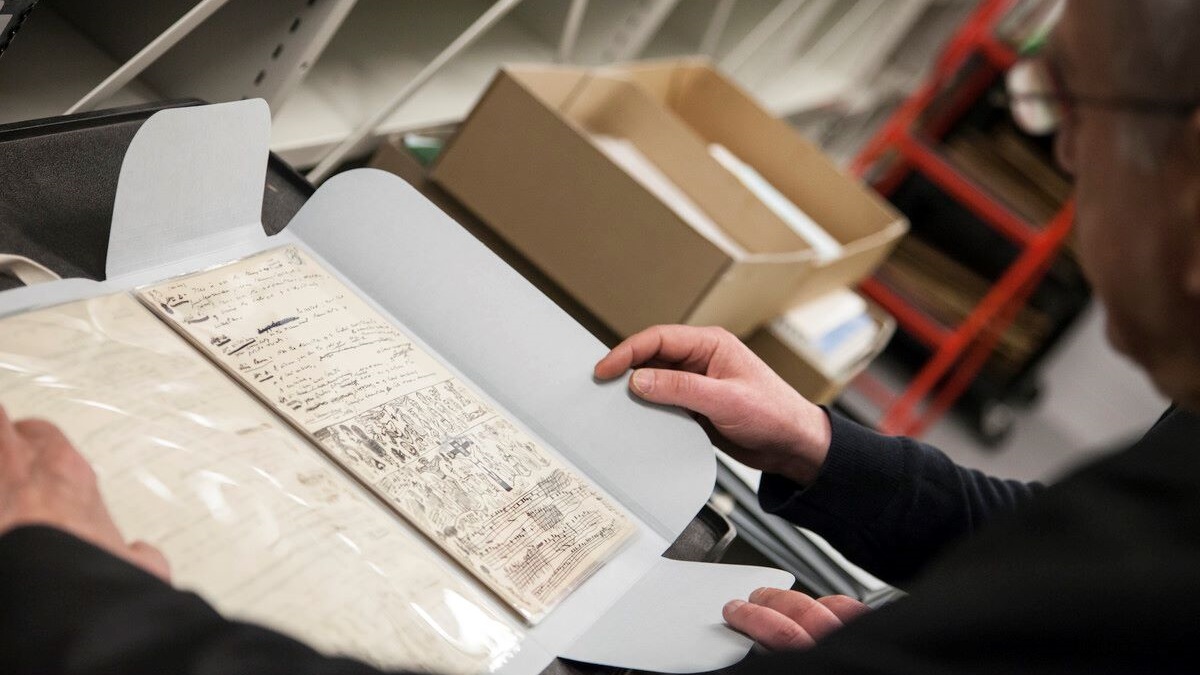 Person looking at old manuscript