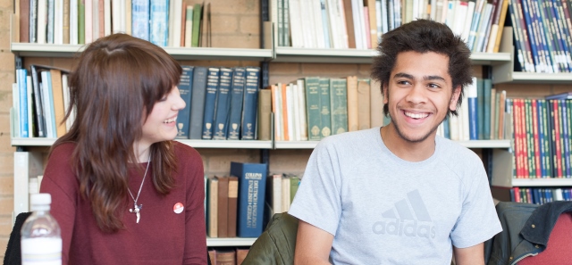 Students laughing at an outreach event