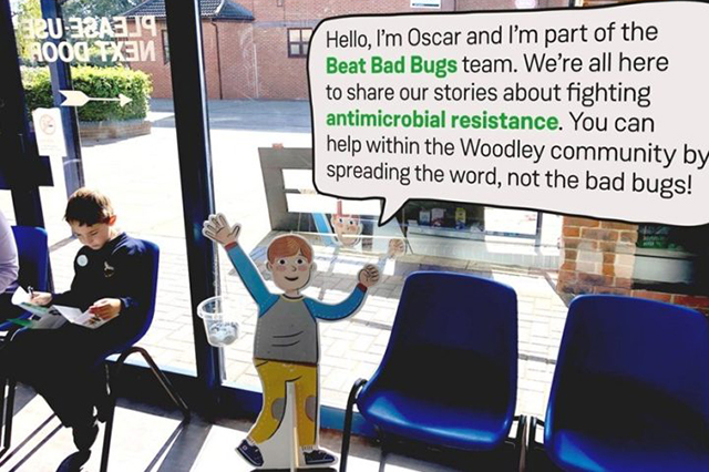 Cardboard character in a doctor's office promoting antimicrobial resistance