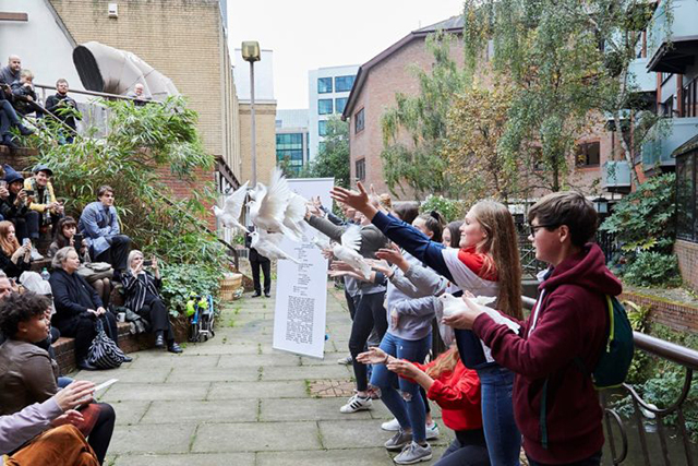 Students release doves at the University of Reading